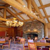 stone fireplace in log lodge